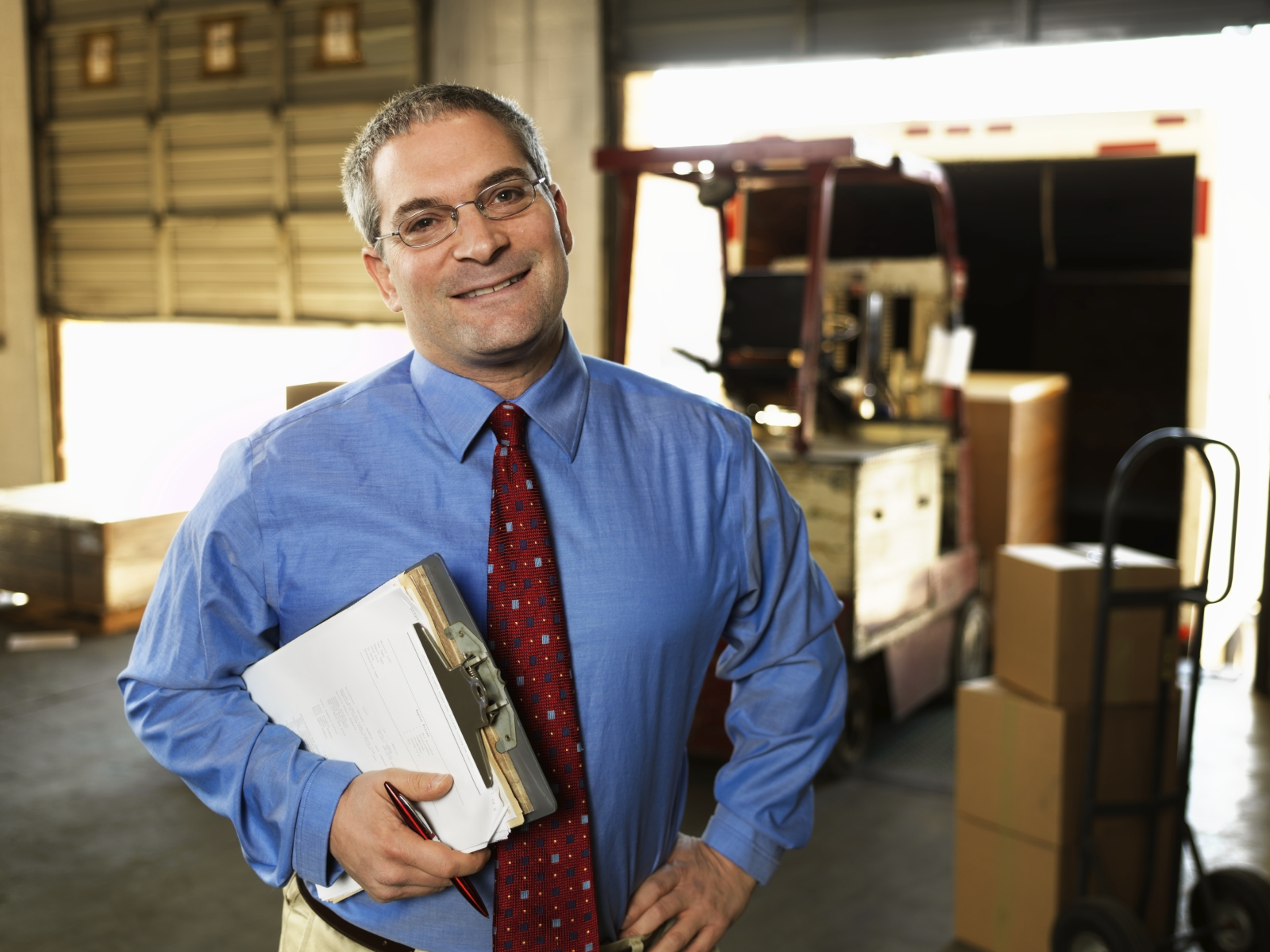 Portrait of Businessman in a Warehouse